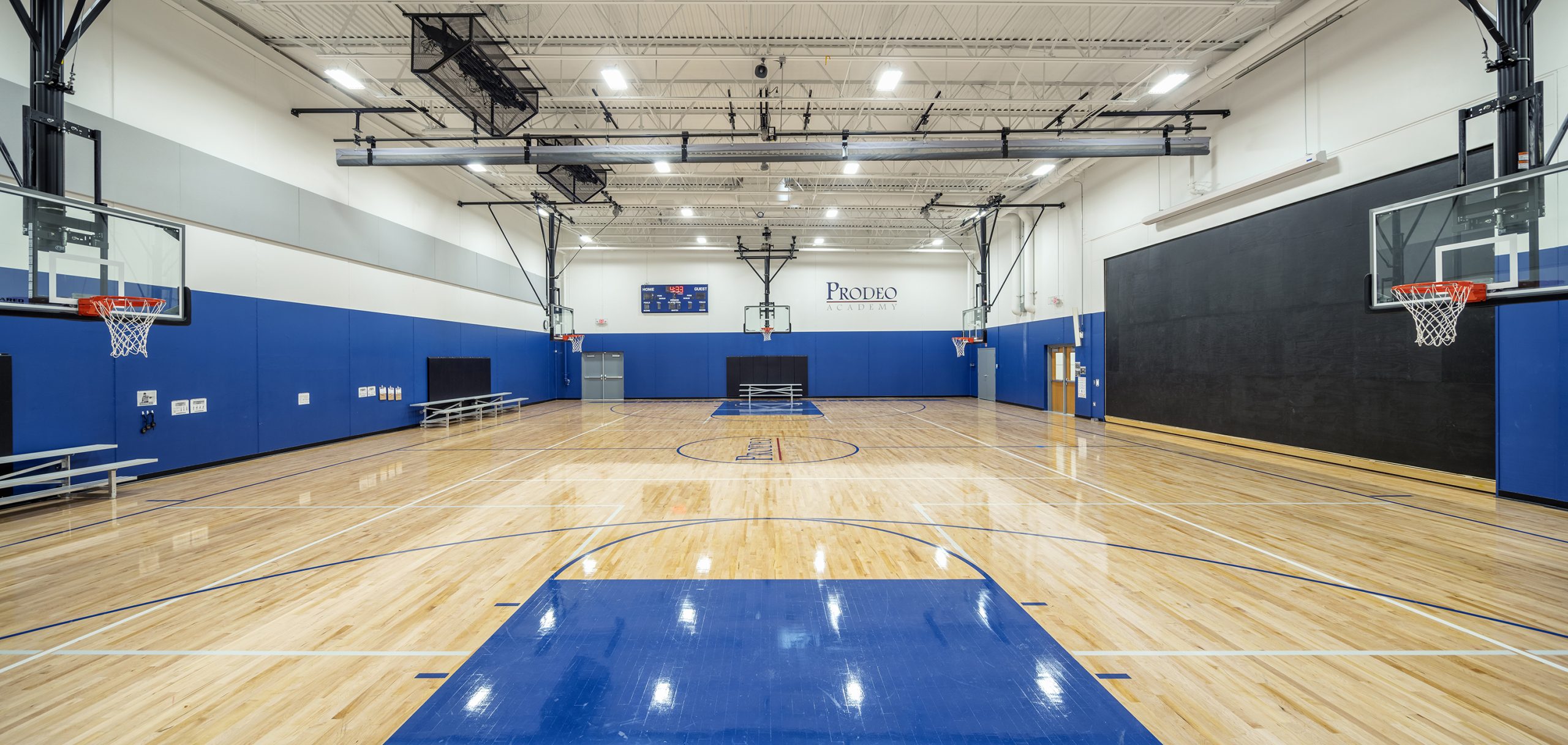 The full-size gym also includes a stage to <strong>maximize the space</strong> to its full potential.