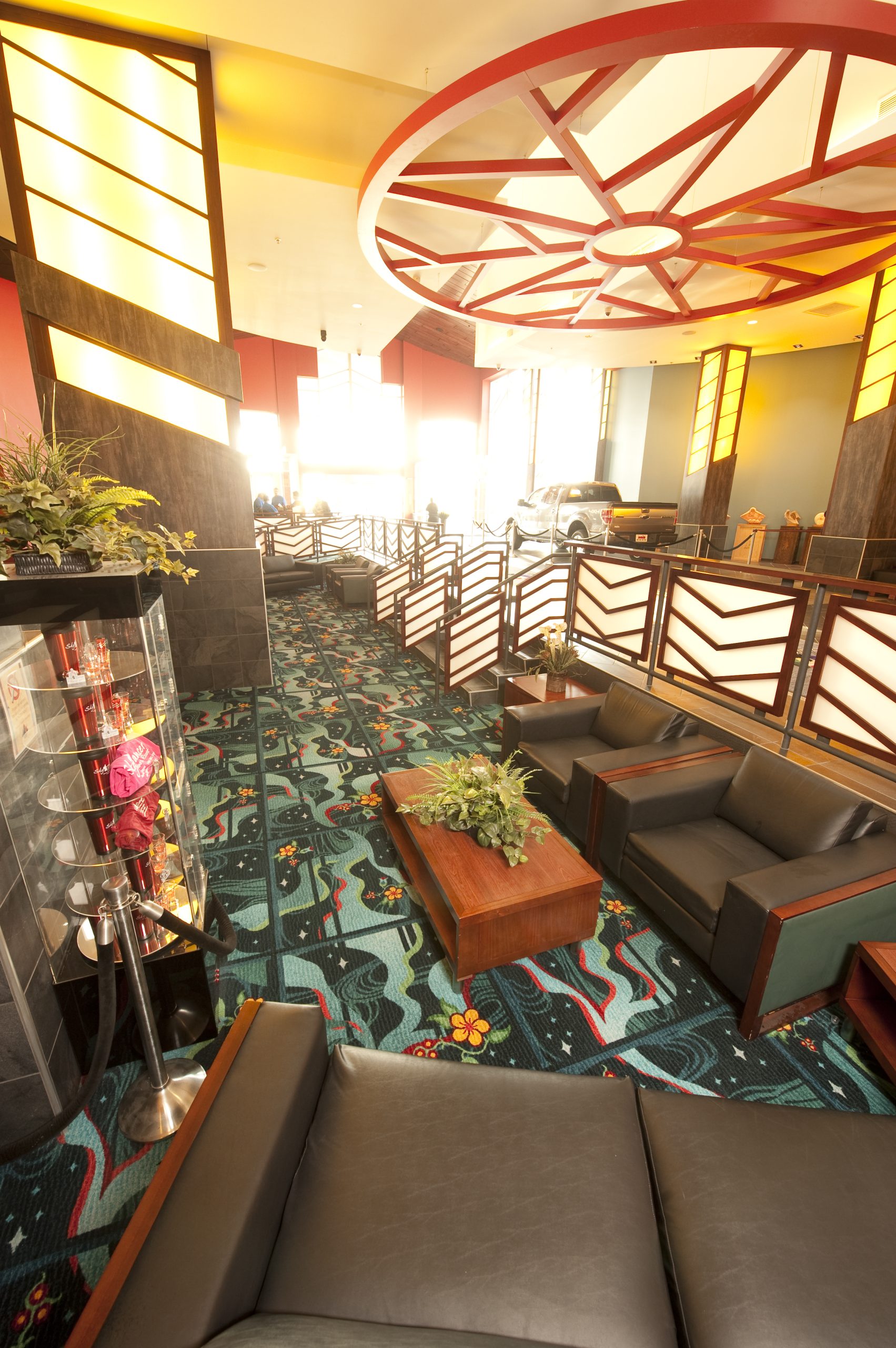 The four directions, birchbark weaving, or pow-wow regalia, and “eagle feather” motifs are blended into the façade and interior décor.