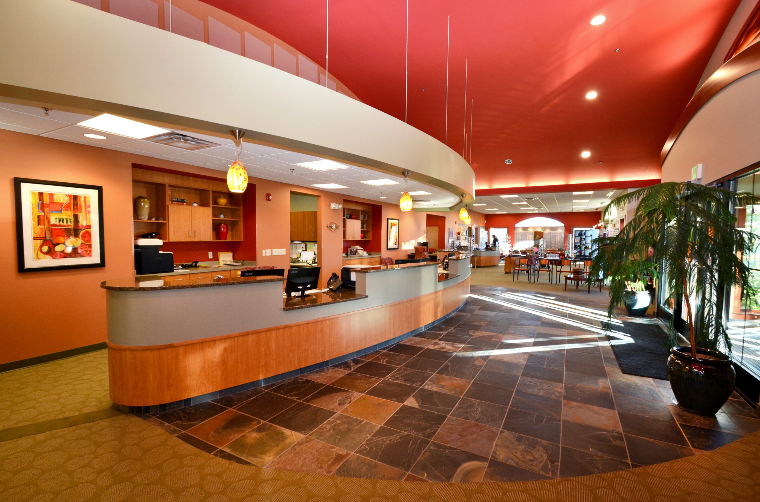 The Interior Design Consultant, Linda Podvin, created a whimsical feel with bold colors and patterns within the welcome area.