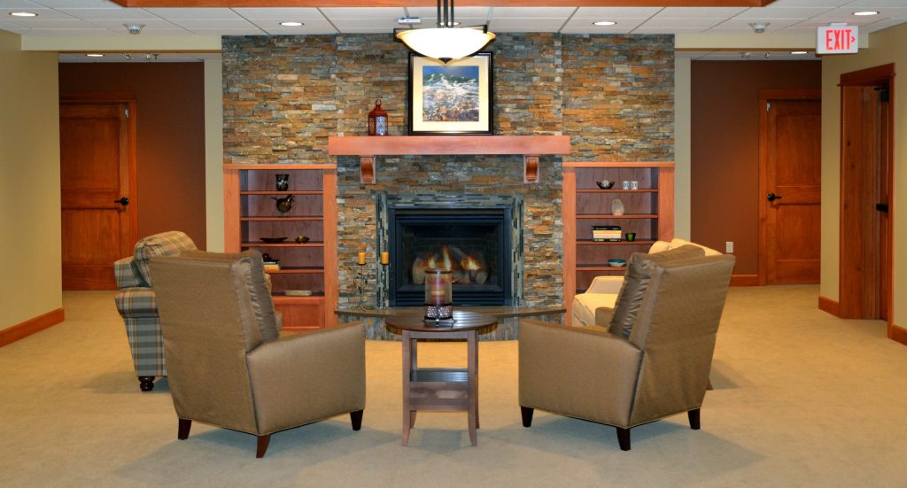 stone fireplace at a DSGW architecture assisted living healthcare building in Minnesota