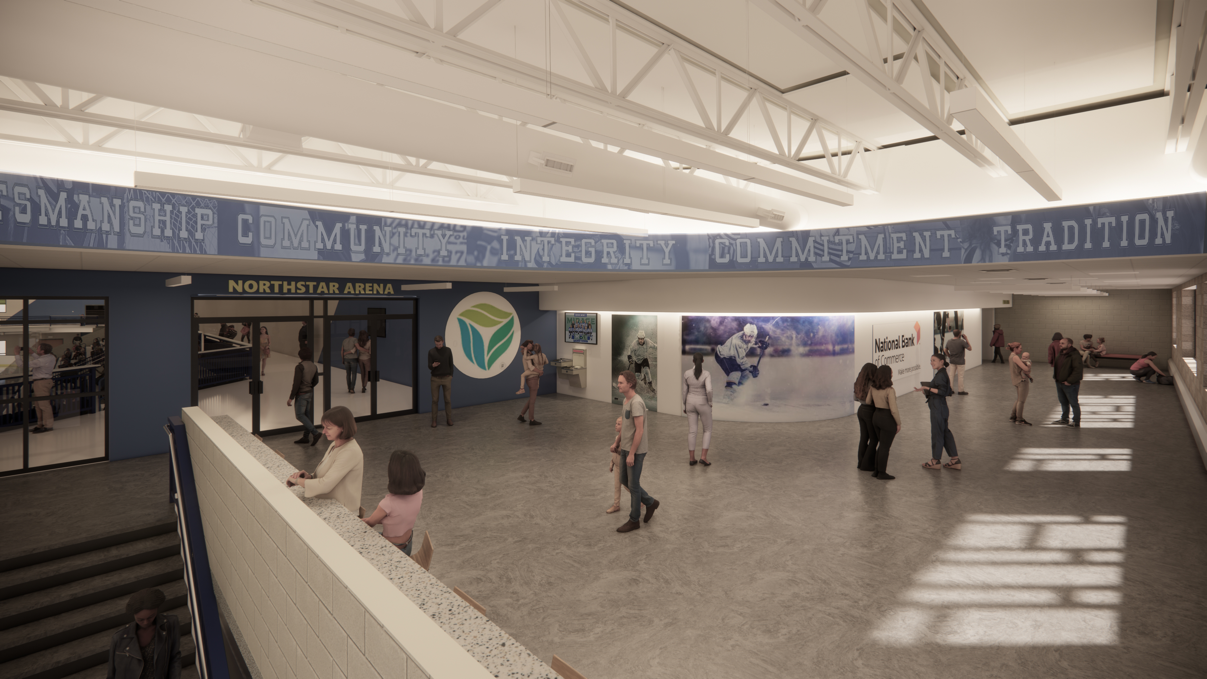 A countertop lining the stairs offers a convenient spot for spectators to watch the action inside the arena or out in the lobby. People gather and walk in a spacious arena lobby with high ceilings, banners displaying words like “sportsmanship,” and a mural of a hockey player. A sign reads “Northstar Arena.” Some people are seated, while others are standing or walking.