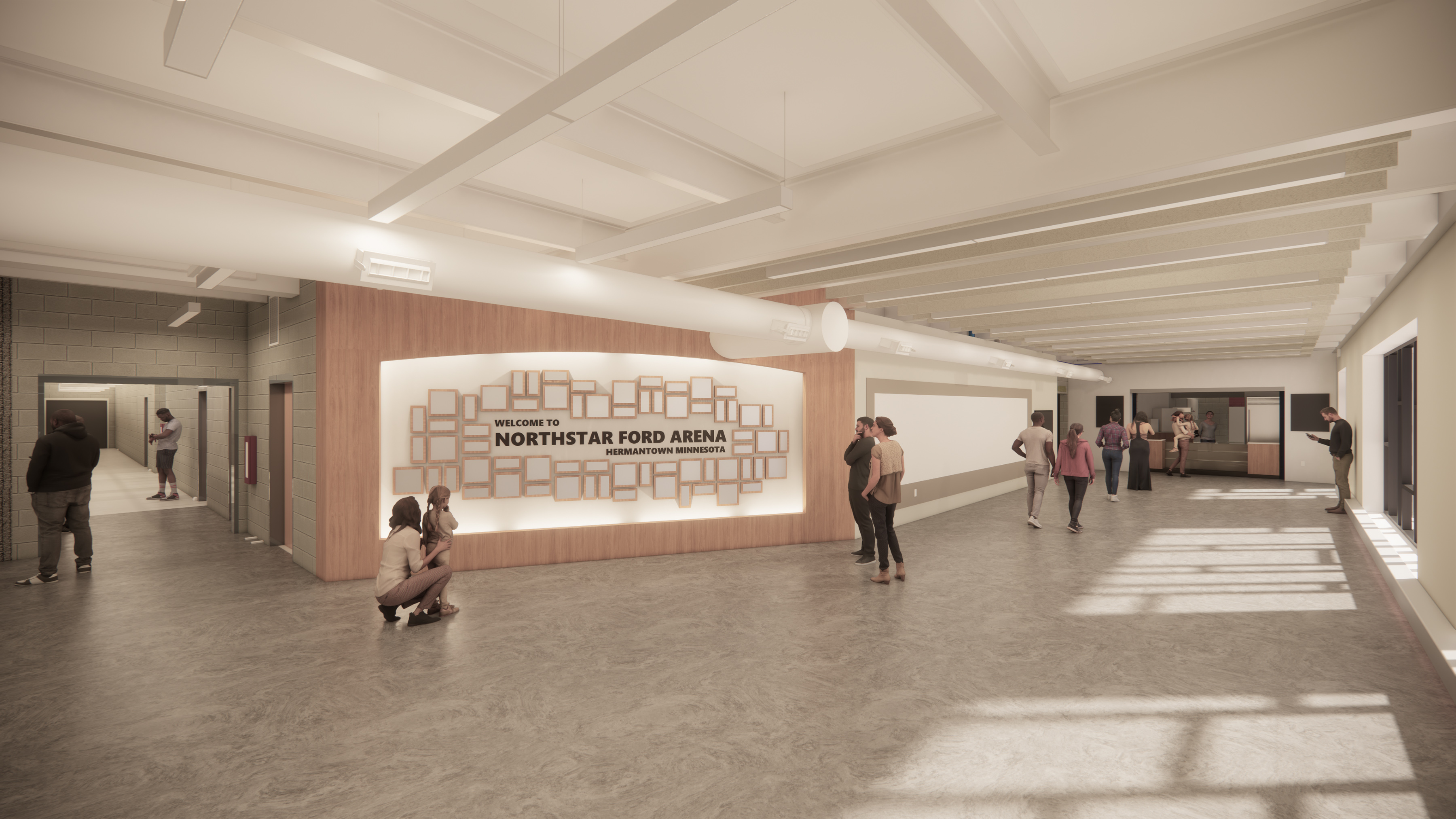 The light, airy space leading to the concessions and entrance to the locker room hallway, features a wall illuminated by hidden perimeter lighting, showcasing plaques honoring arena donors.