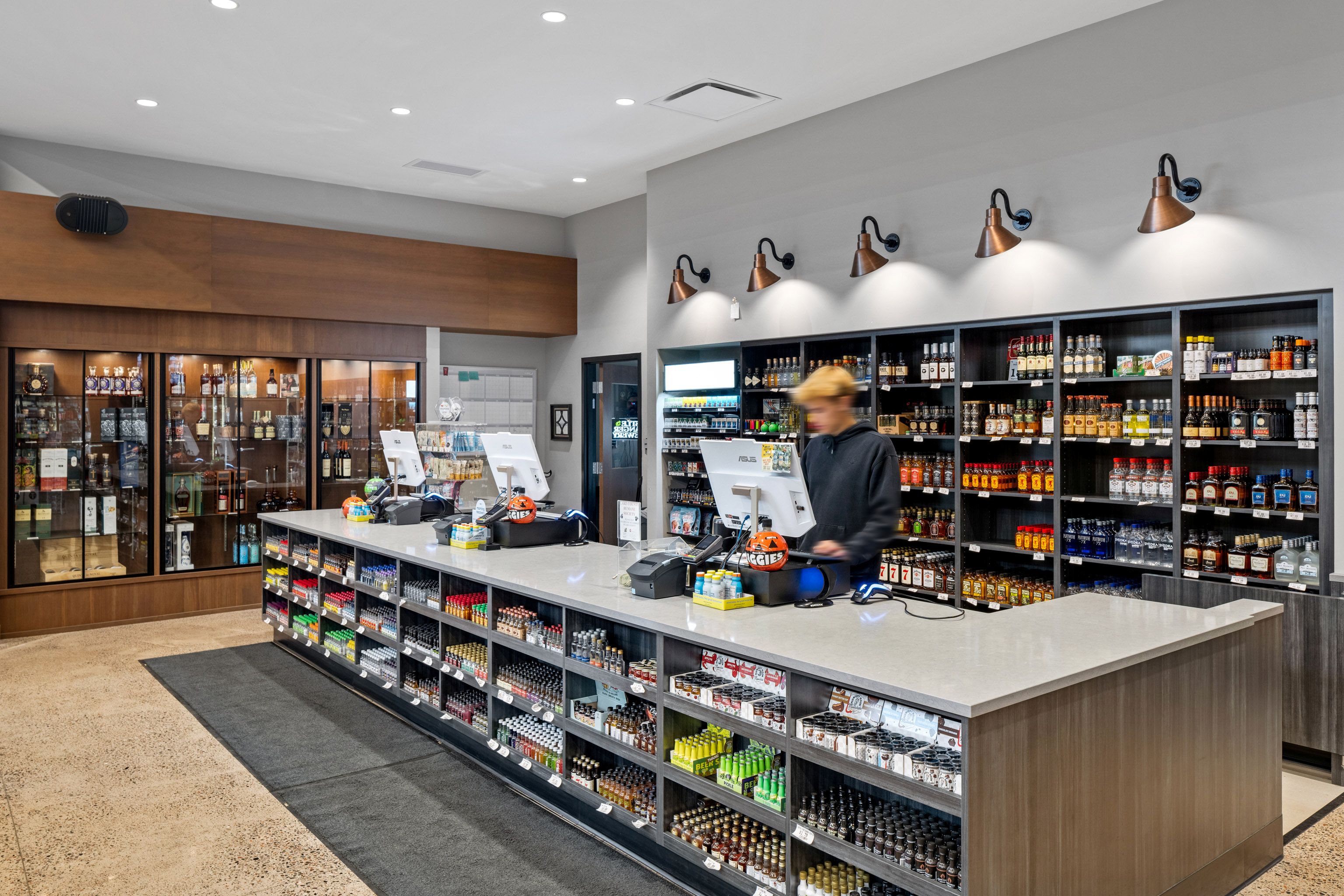 Sleek modern finishes with copper accents provide warmth and a touch of sophistication to the space.